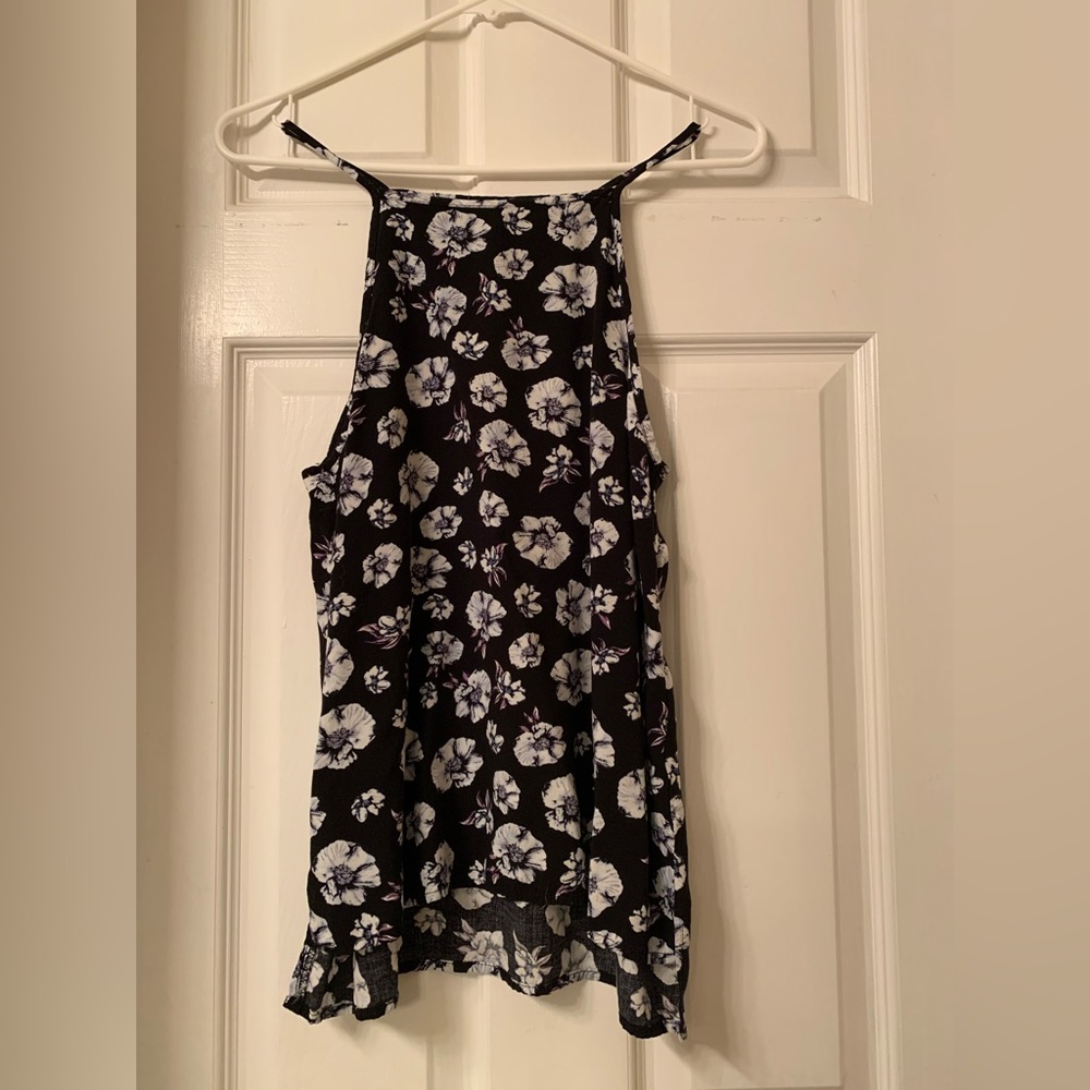 Cotton On x small junior’s lavender colored flowered black top. Used.